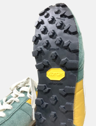 Riparazione - Risuolatura Nike Montreal con zeppa in cuoio e suola Vibram Zegatrac Megagrip dettaglio suola